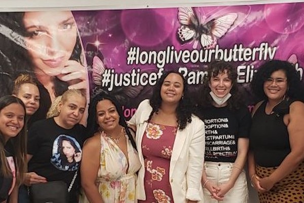 Members of the forum gather for a group picture